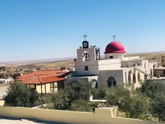 كنيسة القديس جيورجيوس للروم الأرثوذكس في حمود بمحافظة الكرك حيث وقع إطلاق نار خلال تشييع جنازة
